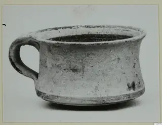 Pottery Levanto-Helladic Ware bowl-jar with a single loop handle, seen from the side against a pale background.