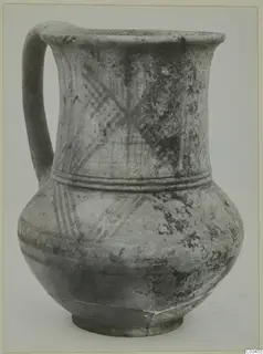 Jug with a single loop handle and painted diagonal hatching on the neck and shoulder, from Enkomi