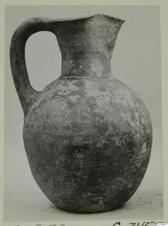 Wheel-made pottery jug with a single strap handle, from Enkomi