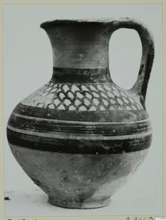 Painted single-handled vessel from Enkomi, shown on a plain background.