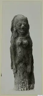 Terracotta figurine of a standing figure with a veiled head