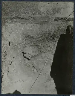 Excavation face at Stylli with horizontal layers of soil and large stones set into the earth