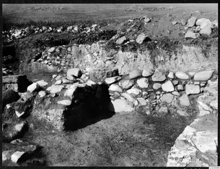 Excavated stone walls and rubble at the Cholades Temples A-B at Soli.