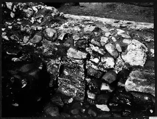 Excavated stone walls and scattered stones at the Cholades Temples A-B at Soli.