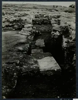 Excavation at Soli, Cholades Temples, showing stone walls and a stone-lined trench