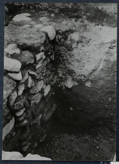 Rough stone wall beside an excavated trench at Soli, Cholades Temples