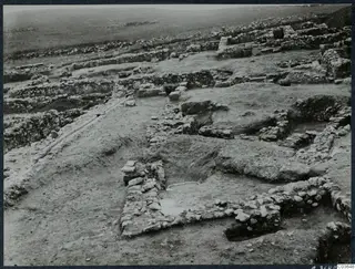 Excavated stone wall foundations at the Cholades Temples A-B at Soli, seen from a raised viewpoint.