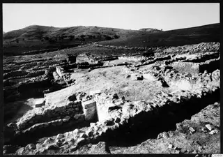 Excavated stone foundations of Temples A and B at Soli, Cholades, with hills behind