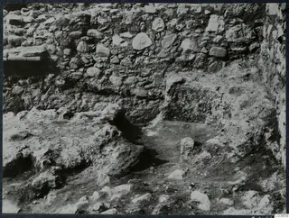 Excavated stone wall of rubble masonry at Soli, Cholades Temples C-F, with uneven earth ground in front