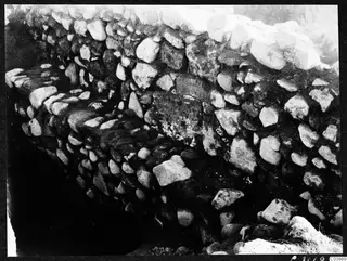 Excavated stone wall at Soli, Cholades Temples A-B, made of rounded and angular stones.
