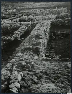 Excavated stone walls and foundations at Soli, seen from above across the Cholades Temples A-B area.