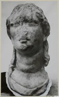 Marble sculpture of a head and bust from Soli, shown from the front