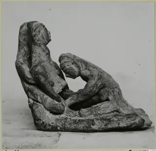 Terracotta group of two human figures on a shared base, one upright and one bent forward toward it