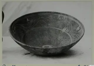 Cypro-Hell. II bowl with pale wavy lines and blotches painted on its dark interior