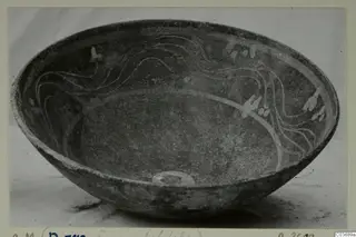Bowl with light painted wavy lines and blob motifs on its inner wall, catalogued as a Cypro-Hell. II bowl