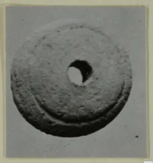Disc-shaped object with a central hole, from Vouni