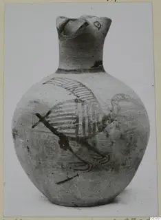 Painted pottery vessel with a bird-head neck and a striped painted bird on its round body