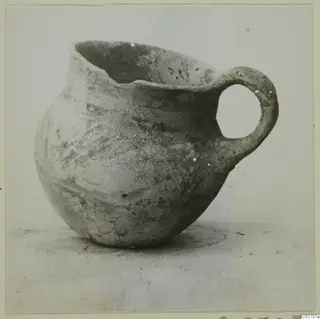 Pottery jug with a single loop handle and wide, slightly uneven mouth, a find from Enkomi
