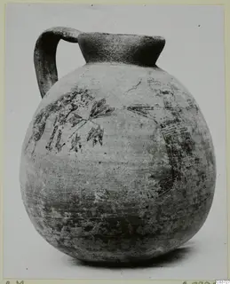 Round-bodied jug with a single handle and dark painted motifs of an animal and plant sprigs, Pottery Bichrome IV