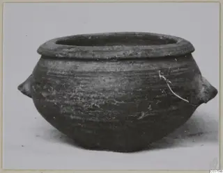 Pottery Stroke Polished Ware pot with a wide rim and two small lug handles