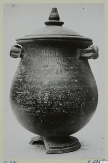 Lidded pot with two loop handles, a knob on the lid and dark decorated bands on the shoulder