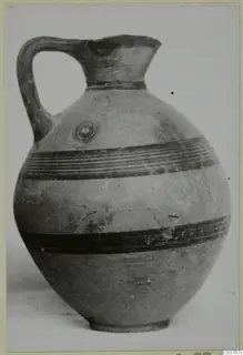 Jug with a single loop handle and dark painted bands, Pottery Black-on-Red II-IV