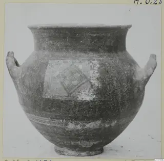 Black Slip Painted pottery jar with two handles and a diamond-patterned panel in pale paint