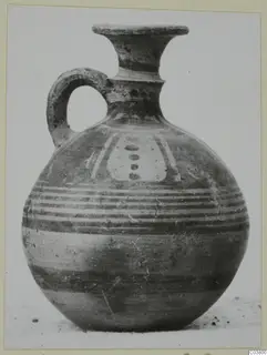 Painted jug with a flaring neck, strap handle and horizontal bands, Pottery Bichrome IV
