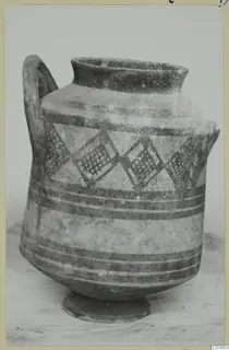 White Painted I amphora with dark painted bands and diamond panels filled with cross-hatching