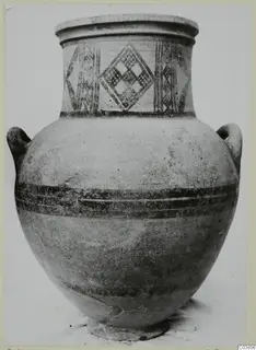 White Painted III-1 pottery jar with two handles and painted diamond motifs on the neck
