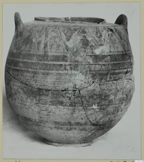 Pottery Bichrome IV jug from the Cyprus Museum, round-bodied with two handles and painted bands