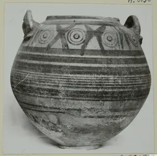 Globular pot with two handles and a painted band of concentric circles and horizontal bands, photographed on a card mount