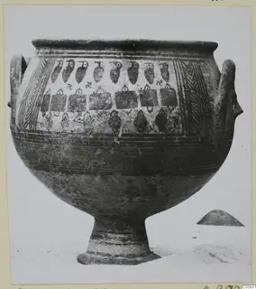 Large footed vessel with two handles, painted with rows of bird-like motifs and panels, photographed on a pale background