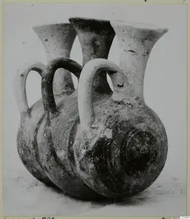 Pottery vessel with three flaring necks and loop handles, titled Pottery Bichrome III