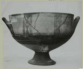 Pedestal bowl with two horizontal handles and painted panels of hatched decoration, seen from the side