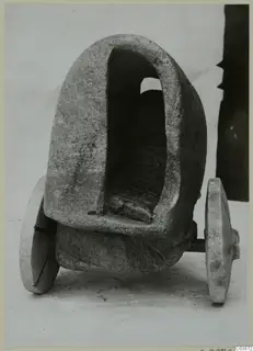 Stone model of a cart with an arched opening and two disc wheels, from Mersinaki