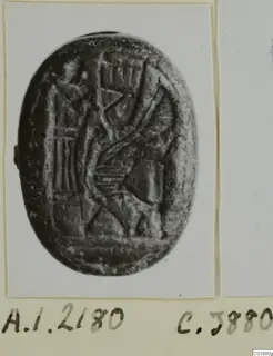 Engraved oval stone seal from Ayia Irini, shown enlarged, with figure-like motifs and hatched lines