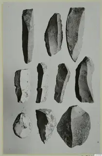 Ten stone tools from Kythrea, blades and flakes arranged in three rows on a pale background.