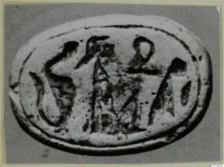 Oval seal or gem face with several engraved signs, find from Amathus