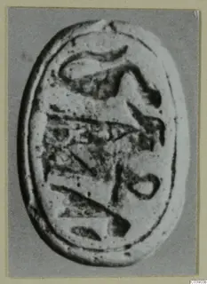 Oval object with an incised design, photographed close up, from Amathus