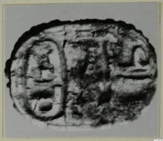 Engraved oval seal from Amathus, shown enlarged in a close view