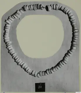 Necklace of many disc-shaped stone beads with a thin wire clasp, from Amathus