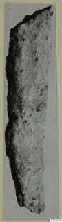 Corroded iron tool from Amathus, long and narrow.