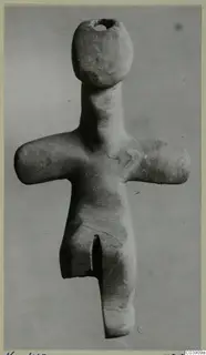 Stone figurine with outstretched arms and a perforated head, from Petra tou Limniti