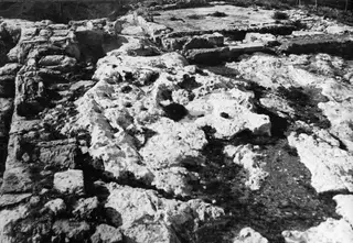 Ruined stone walls and foundations of the Temple of Athena at Vouni, seen from the east.