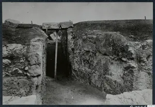 The theatre at Soli: a narrow stone-walled passage, the Eisodos crypt, with a timber prop and stone slabs across it.