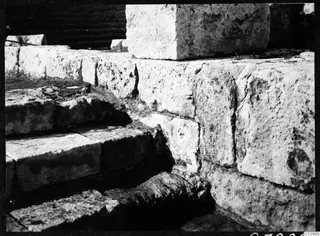Stone steps and masonry blocks of the theatre at Soli during excavation