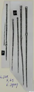 Bronze tools: slender metal rods and pins, photographed in two strips on a mounted photo card