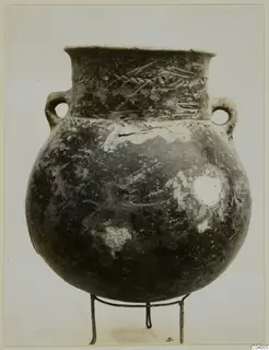 Pottery Red Polished III amphora with two loop handles and incised bands on the neck