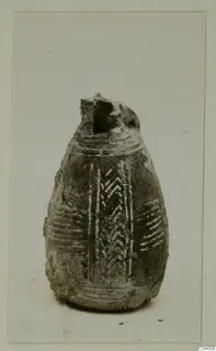 Black Polished pottery vessel from Lapithos with pale chevron pattern and broken neck